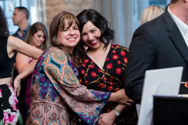 two women hugging at ArtBra
